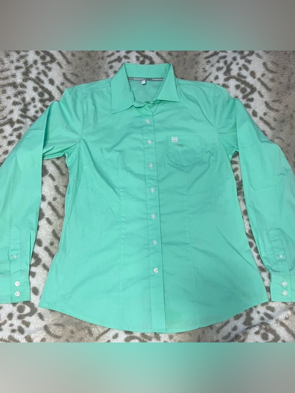 Turquoise Cinch Woman’s Button up.
Size:Medium.